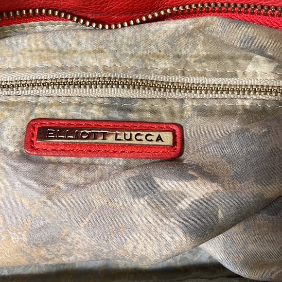 Elliot Lucca Leather Tote.  Can fit in a medium size laptop.  Great work bag. - Picture 4 of 5